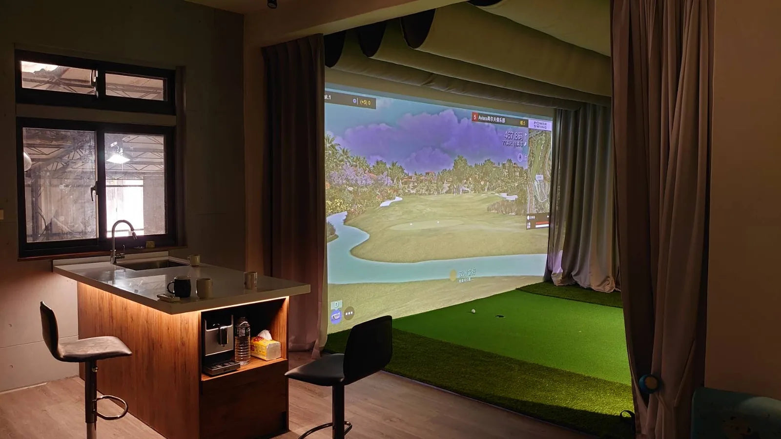 A Power Swing golf simulator installed in a home practice room